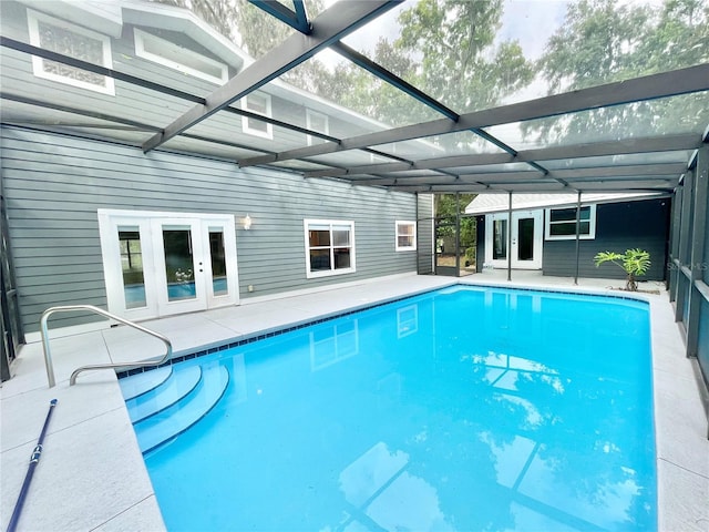 5510 NW 80th Ave, Gainesville, FL 32653 - outdoor pool featuring french doors, a patio area, and glass enclosure