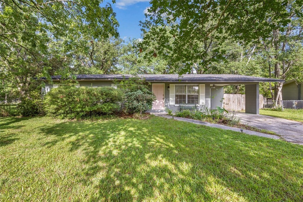 5806 NW 26th Ter, Gainesville, FL 32653 - single story home featuring driveway and an attached carport
