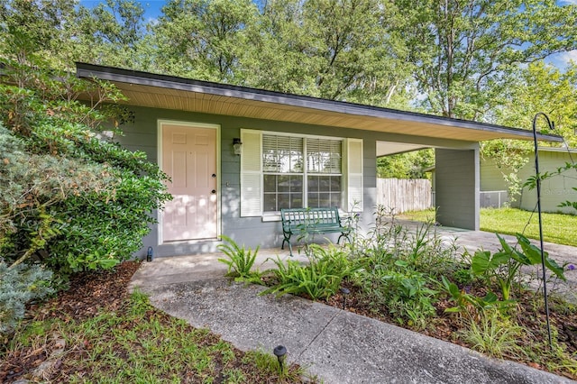 5806 NW 26th Ter, Gainesville, FL 32653 - view of front of property with a porch and concrete block siding