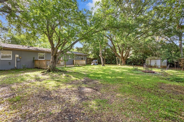 5806 NW 26th Ter, Gainesville, FL 32653 - view of yard with a deck