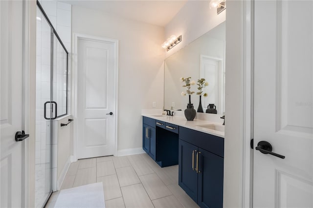 3225 SW 120th Ter, Gainesville, FL 32608 - full bathroom featuring double vanity, a shower stall, tile patterned floors, and baseboards