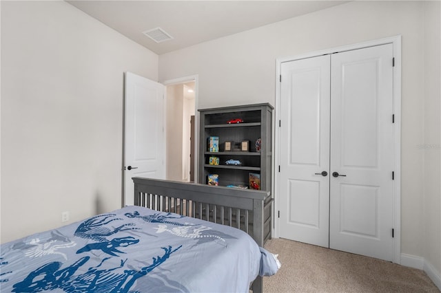 3225 SW 120th Ter, Gainesville, FL 32608 - carpeted bedroom featuring a closet and baseboards