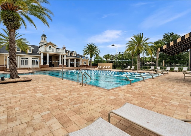 3225 SW 120th Ter, Gainesville, FL 32608 - community pool featuring french doors and a patio area