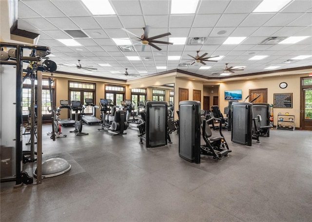 3225 SW 120th Ter, Gainesville, FL 32608 - gym featuring a paneled ceiling, ceiling fan, and crown molding