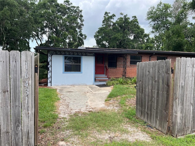 16431 NW US Highway 441, Alachua, FL 32615 - view of front facade with brick siding