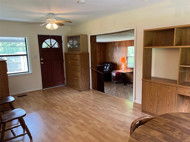 16431 NW US Highway 441, Alachua, FL 32615 - entrance foyer with ceiling fan, light wood-type flooring, and baseboards