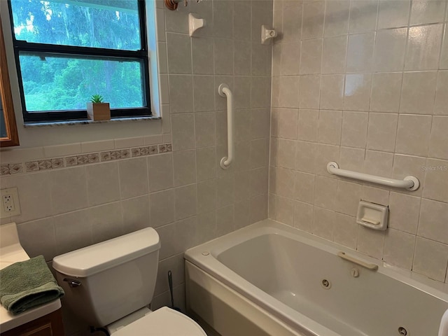 16431 NW US Highway 441, Alachua, FL 32615 - bathroom with toilet, tile walls, and a combined bath / shower with jetted tub