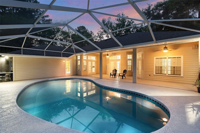 10303 SW 21st Ave, Gainesville, FL 32607 - outdoor pool with a ceiling fan, a patio, and french doors