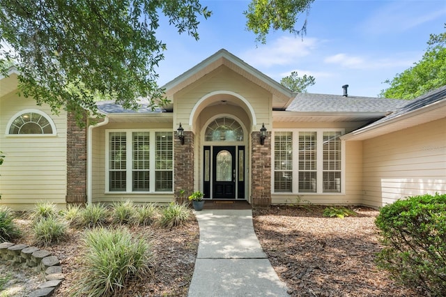 10303 SW 21st Ave, Gainesville, FL 32607 - doorway to property with roof with shingles