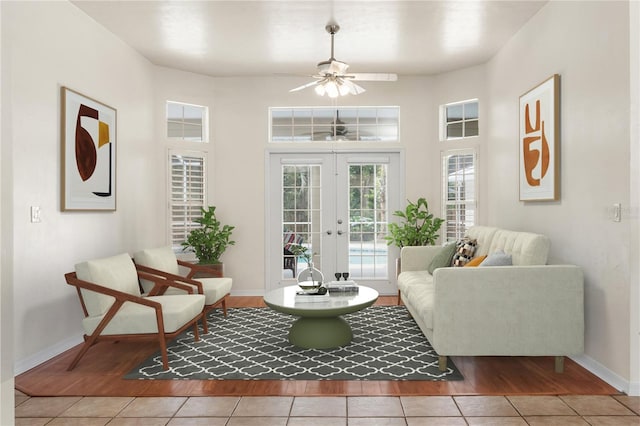 10303 SW 21st Ave, Gainesville, FL 32607 - tiled living room featuring a ceiling fan, baseboards, and french doors