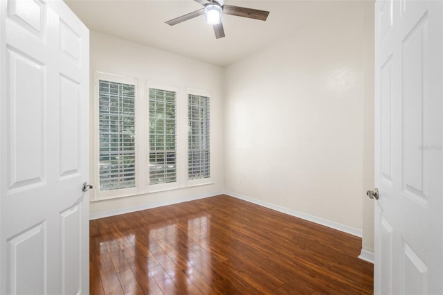 10303 SW 21st Ave, Gainesville, FL 32607 - unfurnished room featuring ceiling fan, baseboards, and dark wood-style flooring