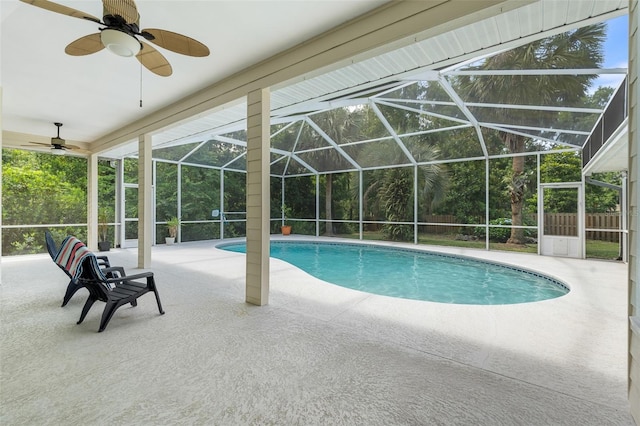 10303 SW 21st Ave, Gainesville, FL 32607 - swimming pool with a ceiling fan, a patio, and glass enclosure