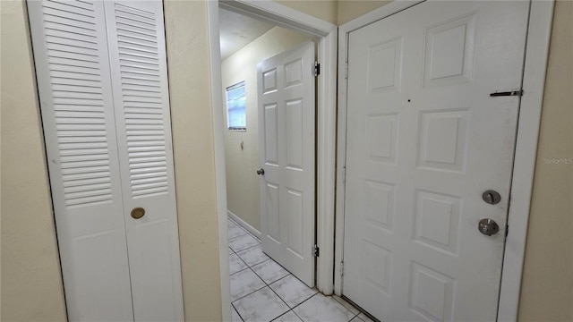 2635 SW 35th Pl Unit 1705, Gainesville, FL 32608 - corridor with light tile patterned floors