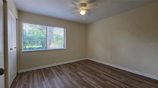2635 SW 35th Pl Unit 1705, Gainesville, FL 32608 - unfurnished room with dark wood-type flooring, a ceiling fan, and baseboards