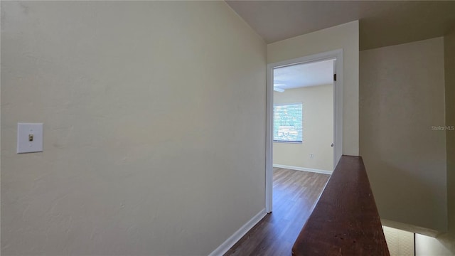 2635 SW 35th Pl Unit 1705, Gainesville, FL 32608 - hallway with dark wood-type flooring and baseboards