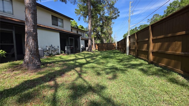 2635 SW 35th Pl Unit 1705, Gainesville, FL 32608 - view of yard with central AC unit