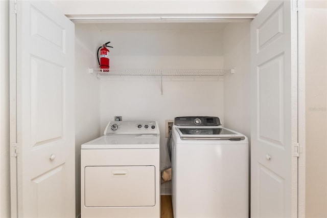 2360 SW Archer Rd Unit 204, Gainesville, FL 32608 - washroom featuring separate washer and dryer