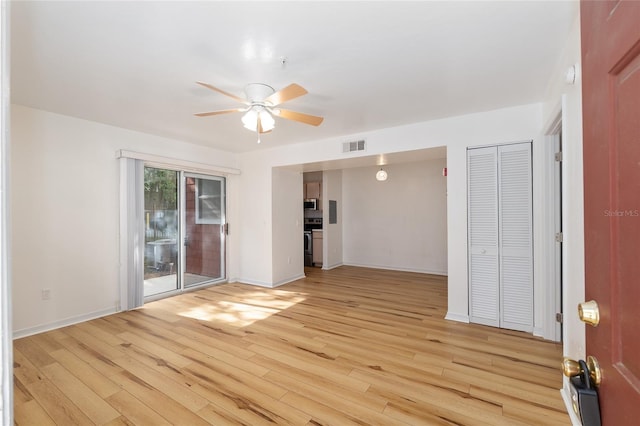 2360 SW Archer Rd Unit 204, Gainesville, FL 32608 - empty room with ceiling fan, light wood-style flooring, and baseboards