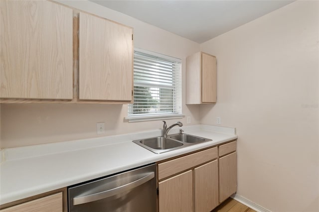 2360 SW Archer Rd Unit 204, Gainesville, FL 32608 - kitchen featuring light brown cabinetry, stainless steel dishwasher, a sink, and light countertops