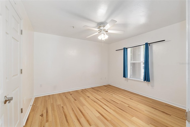 2360 SW Archer Rd Unit 204, Gainesville, FL 32608 - spare room with a ceiling fan, light wood-type flooring, and baseboards