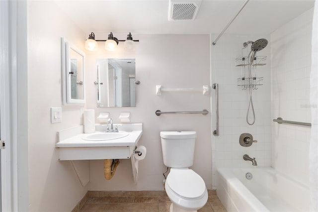 2360 SW Archer Rd Unit 204, Gainesville, FL 32608 - bathroom with a sink, toilet, tub / shower combination, and tile patterned flooring