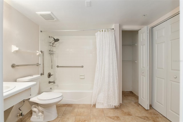 2360 SW Archer Rd Unit 204, Gainesville, FL 32608 - full bath featuring toilet, a closet, and shower / bathtub combination with curtain