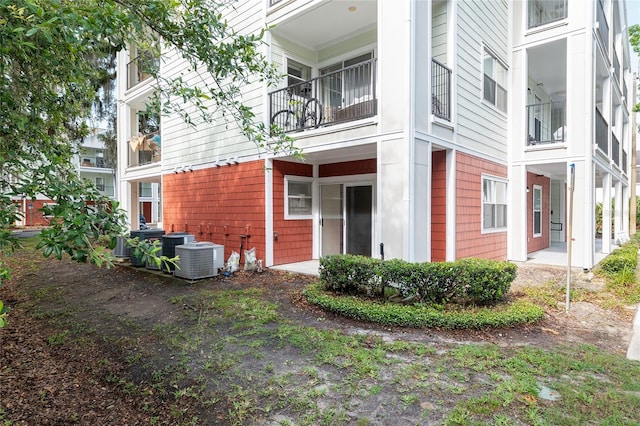 2360 SW Archer Rd Unit 204, Gainesville, FL 32608 - view of property featuring central air condition unit