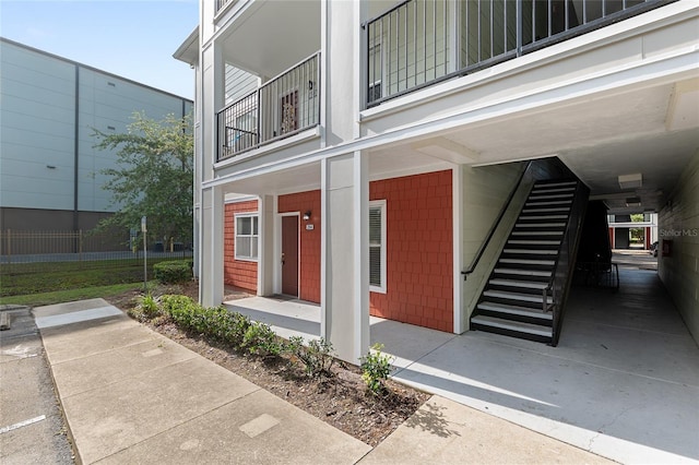 2360 SW Archer Rd Unit 204, Gainesville, FL 32608 - doorway to property with a balcony