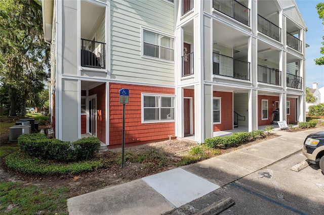 2360 SW Archer Rd Unit 204, Gainesville, FL 32608 - view of property with central AC unit