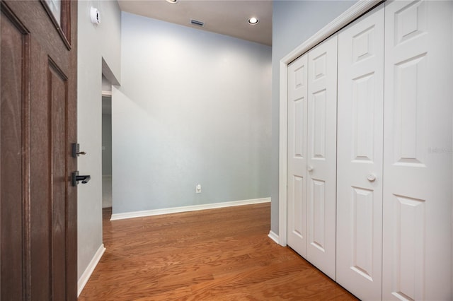 6425 NW 97th Ct, Gainesville, FL 32653 - hallway featuring light wood-style flooring, recessed lighting, and baseboards