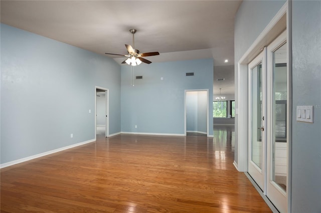 6425 NW 97th Ct, Gainesville, FL 32653 - unfurnished room featuring a ceiling fan, wood finished floors, and baseboards