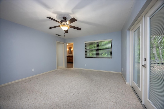 6425 NW 97th Ct, Gainesville, FL 32653 - empty room with light carpet, baseboards, and ceiling fan