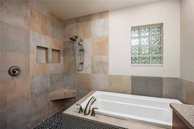 6425 NW 97th Ct, Gainesville, FL 32653 - bathroom with a bath, tile walls, tiled shower, and vanity