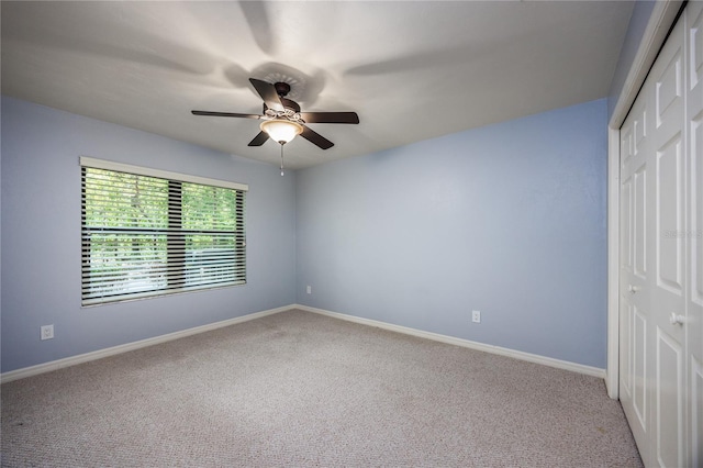 6425 NW 97th Ct, Gainesville, FL 32653 - unfurnished bedroom with a closet, carpet, and baseboards