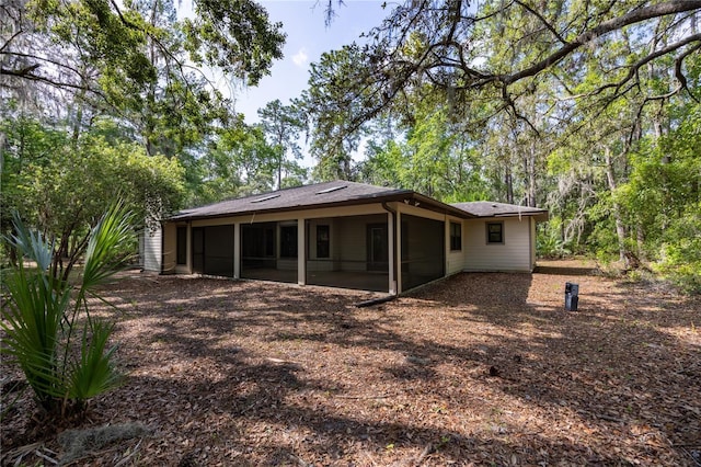 6425 NW 97th Ct, Gainesville, FL 32653 - back of property with a sunroom