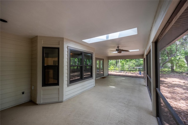 6425 NW 97th Ct, Gainesville, FL 32653 - unfurnished sunroom featuring a skylight and french doors