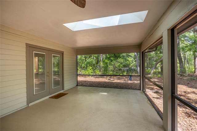 6425 NW 97th Ct, Gainesville, FL 32653 - unfurnished sunroom featuring french doors and a skylight
