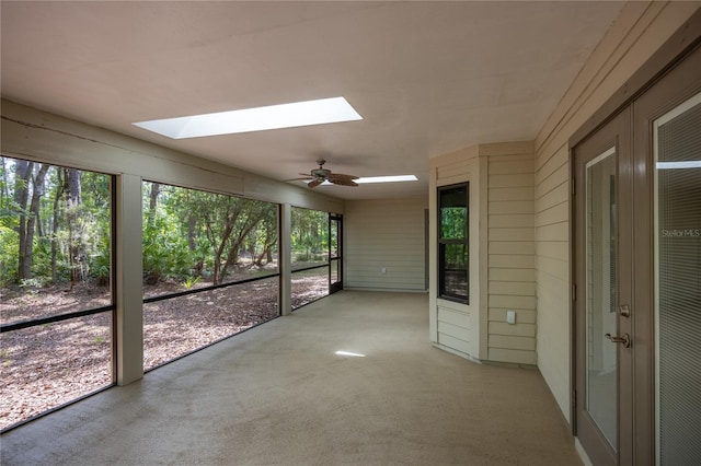 6425 NW 97th Ct, Gainesville, FL 32653 - unfurnished sunroom featuring a skylight and ceiling fan