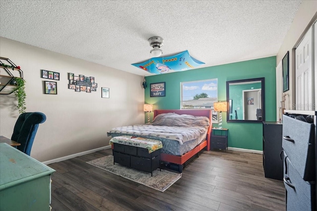24 Sapphire Way, Ocala, FL 34472 - bedroom featuring wood finished floors, a textured ceiling, baseboards, and a ceiling fan