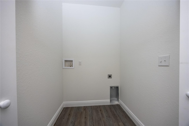 15217 NW 134th Ter, Alachua, FL 32615 - washroom featuring electric dryer hookup, dark wood finished floors, washer hookup, and baseboards