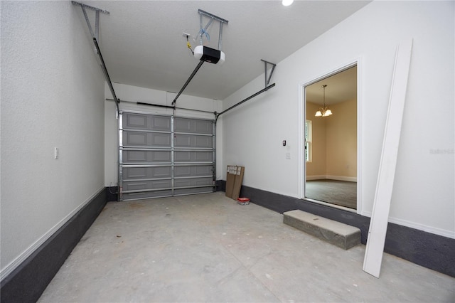 15217 NW 134th Ter, Alachua, FL 32615 - garage featuring a garage door opener and baseboards