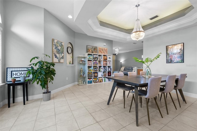 6516 NW 109th Pl, Alachua, FL 32615 - dining area with a chandelier, baseboards, a raised ceiling, crown molding, and light tile patterned flooring