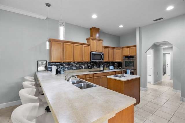 6516 NW 109th Pl, Alachua, FL 32615 - kitchen with a sink, appliances with stainless steel finishes, baseboards, and recessed lighting