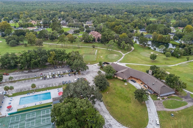 6516 NW 109th Pl, Alachua, FL 32615 - drone / aerial view of a golf club, a large body of water, and a heavily wooded area