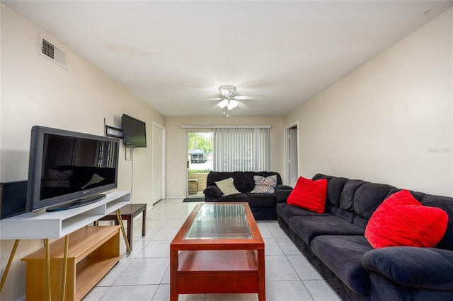 3921 SW 34th St Unit 106, Gainesville, FL 32608 - living area with light tile patterned floors and ceiling fan