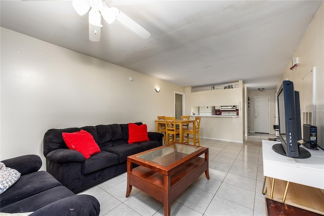 3921 SW 34th St Unit 106, Gainesville, FL 32608 - living room with light tile patterned floors and ceiling fan