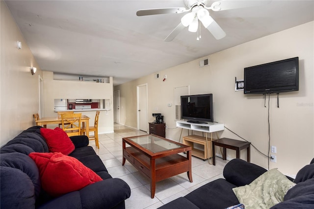 3921 SW 34th St Unit 106, Gainesville, FL 32608 - living room featuring light tile patterned floors and ceiling fan