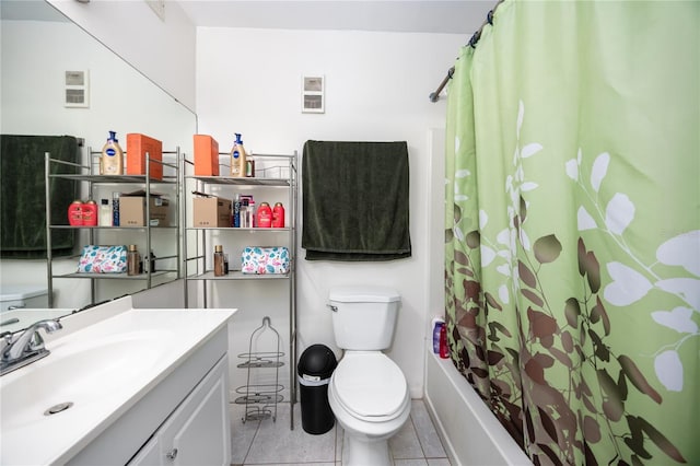 3921 SW 34th St Unit 106, Gainesville, FL 32608 - full bathroom featuring vanity, tile patterned floors, and shower / tub combo with curtain