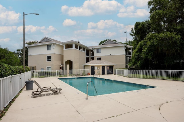 3921 SW 34th St Unit 106, Gainesville, FL 32608 - community pool featuring a patio area