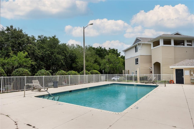3921 SW 34th St Unit 106, Gainesville, FL 32608 - community pool featuring a patio area